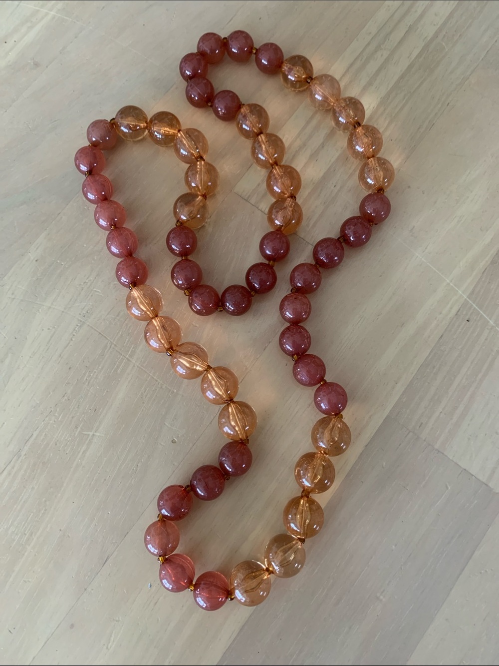 2 Tone Beaded Necklace. 28” Long.Amber /Peach Tones.